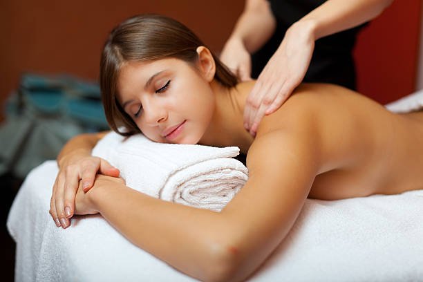 Woman having a massage in a spa